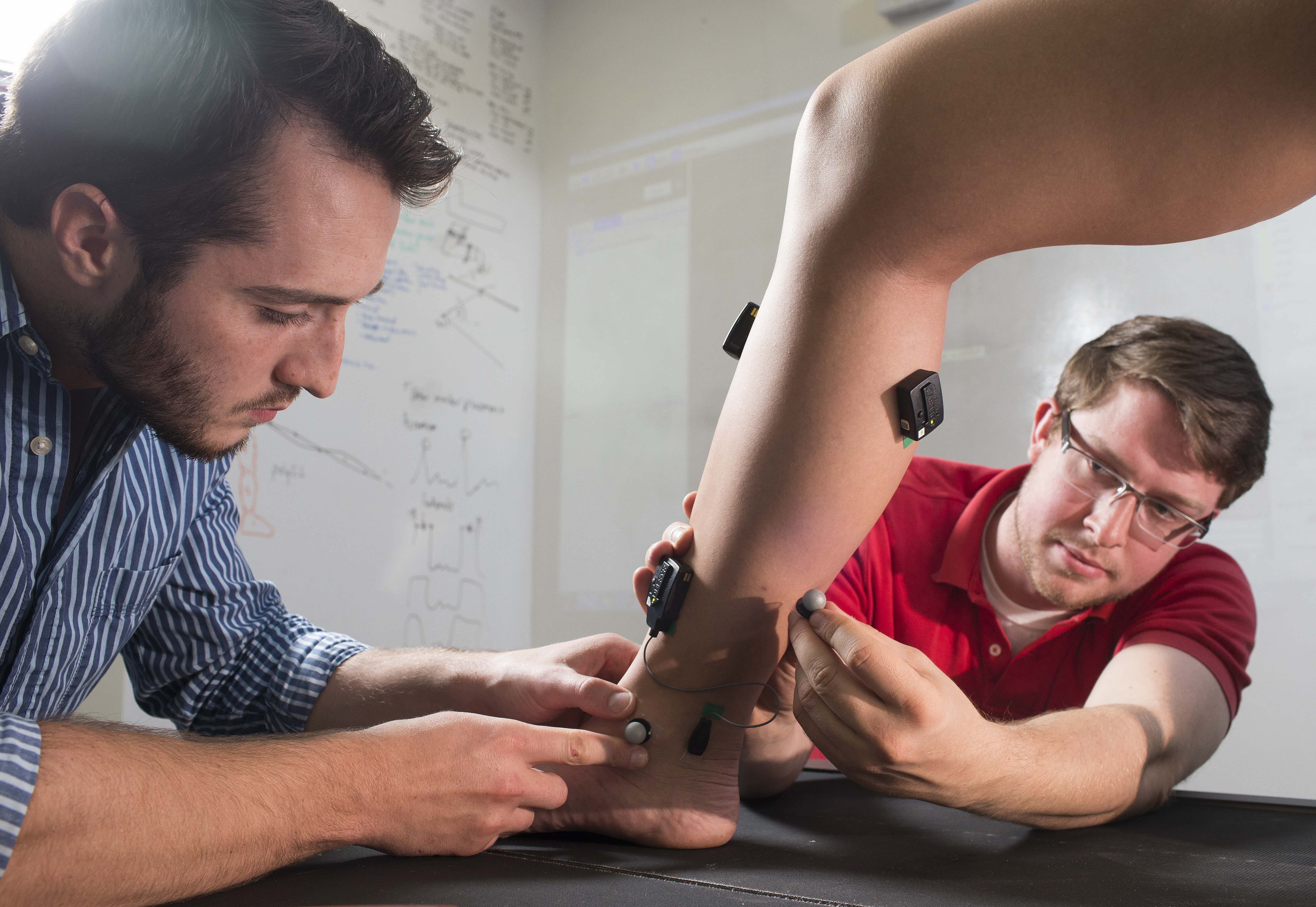 Karl Zelik and research lab members. Lab member photos in research setting (research "action" shots, and also a group photo). The lab consists of 6 members, including the PI. Photos will be used on the lab website (lab.vanderbilt.edu/zelik/) and for publications, including an upcoming Research & Innovation article in which our research will be featured (external publication). Photos by Joe Howell