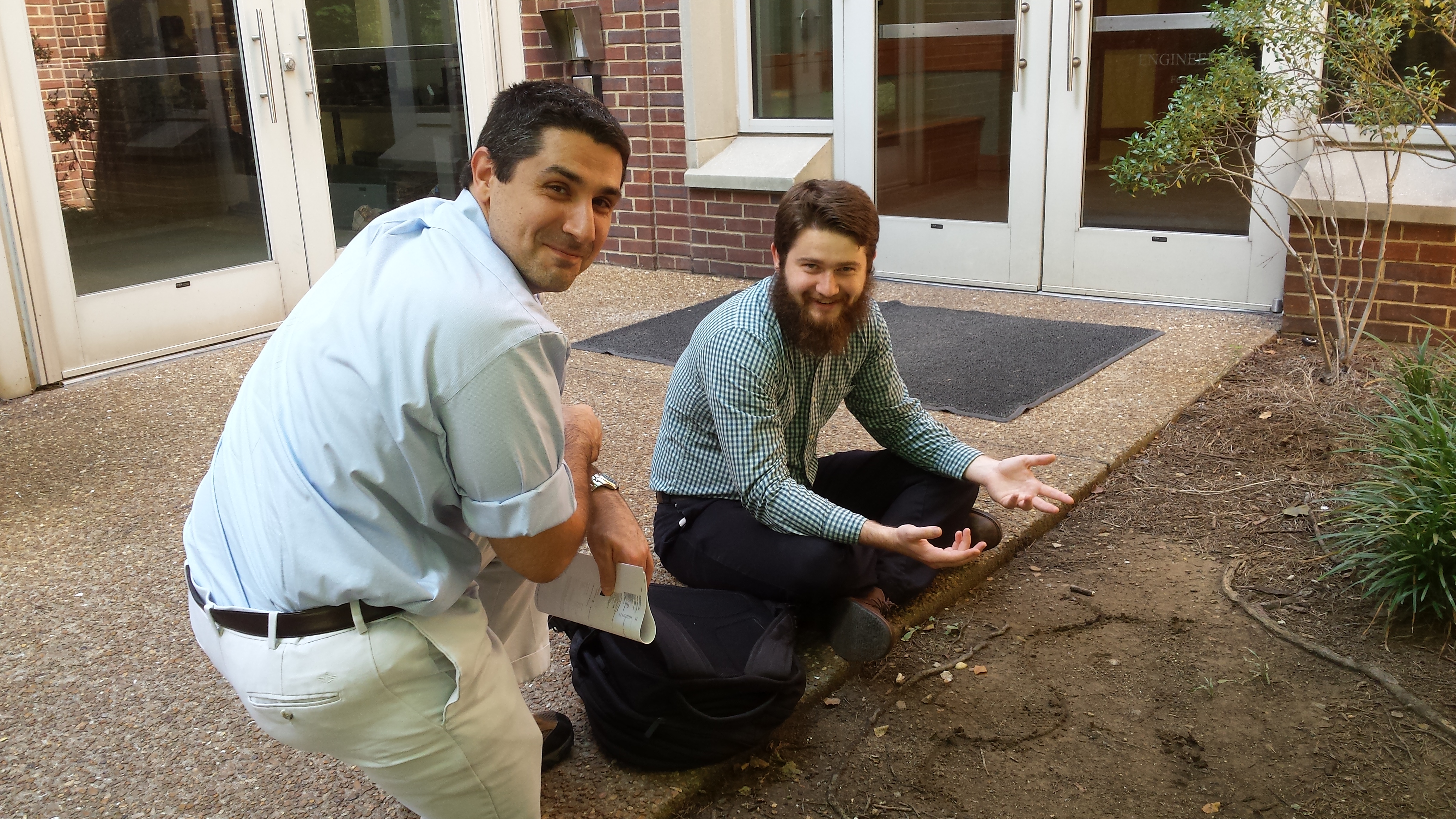 pic 12 - who needs a whiteborad when you have a stick and mud