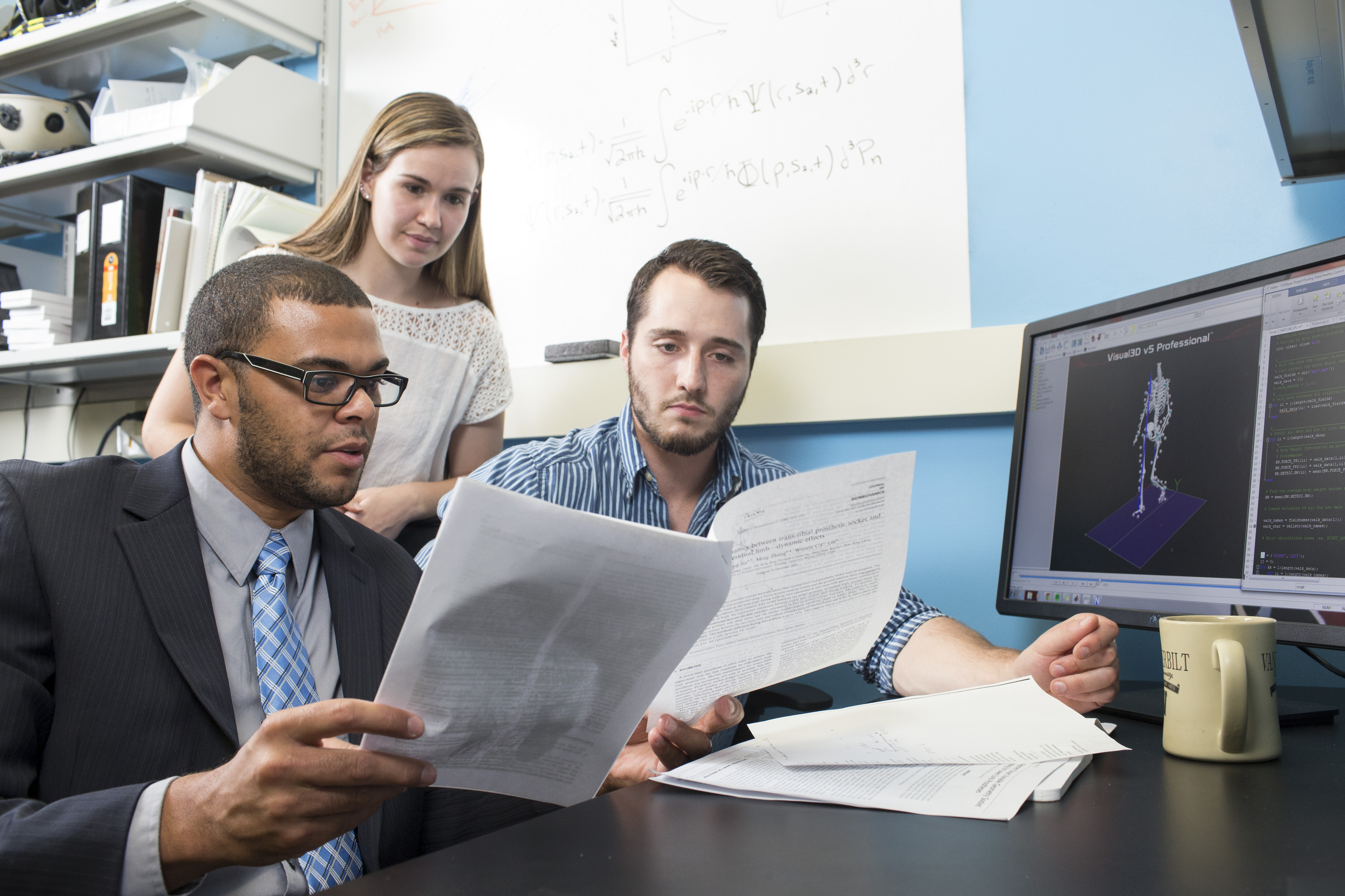 Karl Zelik and research lab members. Lab member photos in research setting (research "action" shots, and also a group photo). The lab consists of 6 members, including the PI. Photos will be used on the lab website (lab.vanderbilt.edu/zelik/) and for publications, including an upcoming Research & Innovation article in which our research will be featured (external publication). Photos by Joe Howell